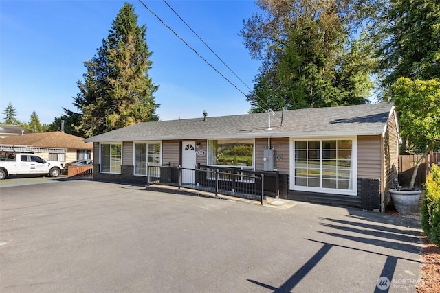 5004 188th St SW, Lynnwood, WA 98037 - view of front facade featuring a shingled roof