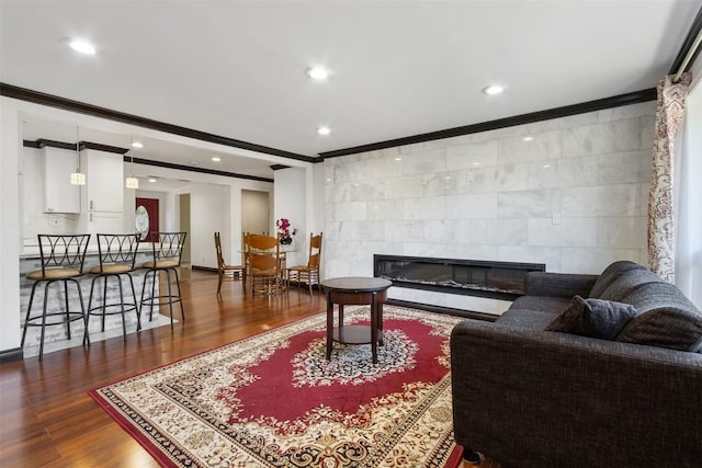 5004 188th St SW, Lynnwood, WA 98037 - living area featuring ornamental molding, dark wood-style floors, a fireplace, recessed lighting, and baseboards
