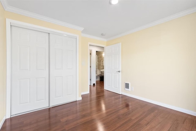5004 188th St SW, Lynnwood, WA 98037 - unfurnished bedroom with baseboards, wood finished floors, crown molding, a closet, and recessed lighting
