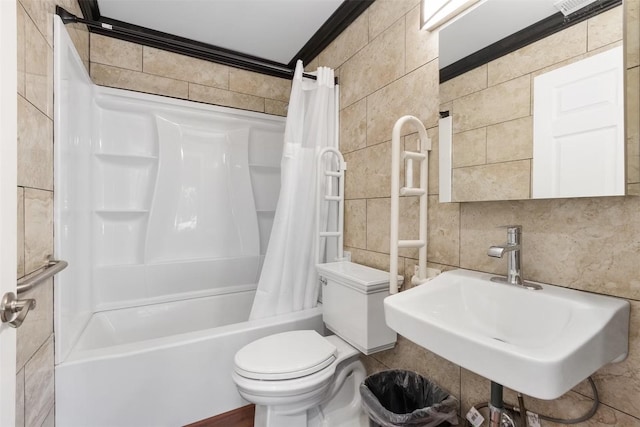 5004 188th St SW, Lynnwood, WA 98037 - bathroom with tile walls, shower / bath combo with shower curtain, toilet, a sink, and decorative backsplash