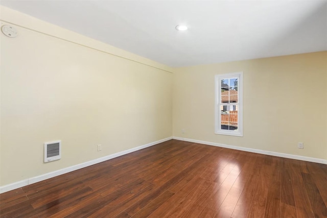 5004 188th St SW, Lynnwood, WA 98037 - unfurnished room with baseboards, wood finished floors, recessed lighting, and a smoke detector