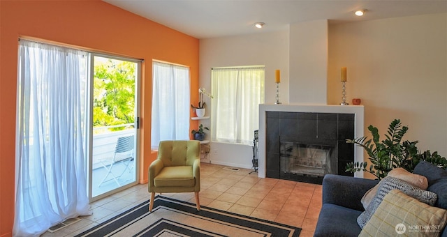 301 Canyon Pl, Wenatchee, WA 98801 - living room featuring plenty of natural light, tile patterned flooring, a fireplace, and recessed lighting