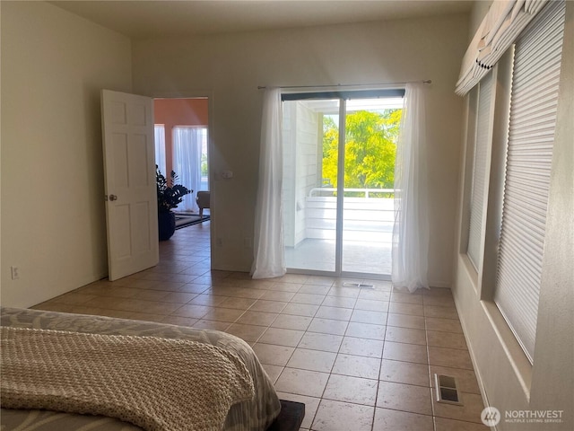 301 Canyon Pl, Wenatchee, WA 98801 - bedroom featuring access to outside and light tile patterned floors