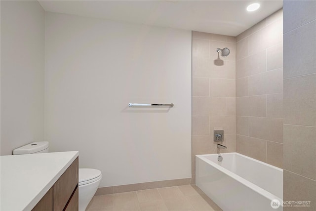121 Stewart St Unit 2507, Seattle, WA 98101 - bathroom with vanity, toilet,  shower combination, tile patterned floors, and baseboards