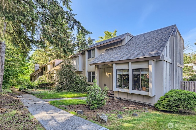 12304 NE 147th Ct, Kirkland, WA 98034 - view of front of home featuring a shingled roof and board and batten siding