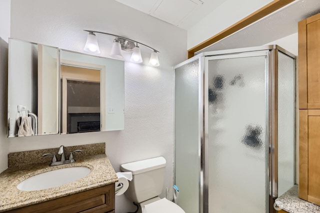 12304 NE 147th Ct, Kirkland, WA 98034 - bathroom featuring a shower stall, vanity, and toilet