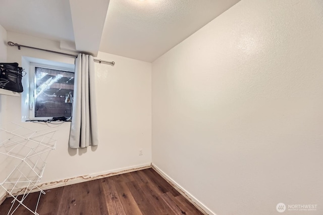 12304 NE 147th Ct, Kirkland, WA 98034 - unfurnished room featuring dark wood-type flooring and baseboards