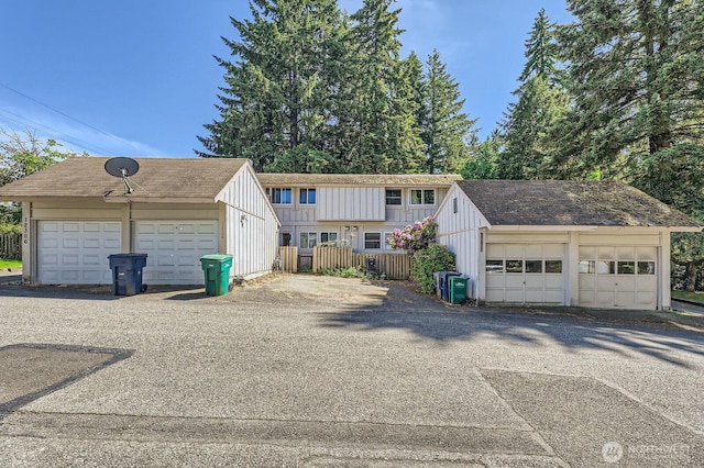 12304 NE 147th Ct, Kirkland, WA 98034 - view of front of property with an outbuilding, board and batten siding, and a garage