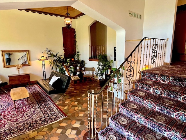 220 W Olympic Pl Unit 309, Seattle, WA 98119 - staircase featuring tile patterned floors