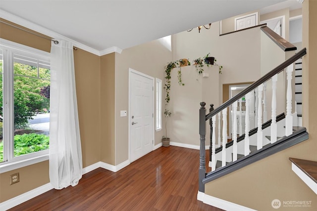 24213 41st Ave E, Spanaway, WA 98387 - foyer featuring wood finished floors, baseboards, and stairs