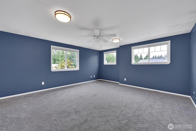 24213 41st Ave E, Spanaway, WA 98387 - carpeted empty room with ceiling fan and baseboards