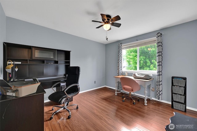 24213 41st Ave E, Spanaway, WA 98387 - home office with a ceiling fan, wood finished floors, and baseboards