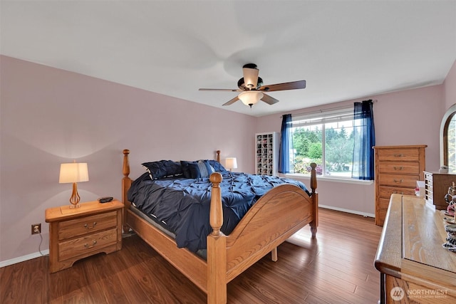 24213 41st Ave E, Spanaway, WA 98387 - bedroom with baseboards, wood finished floors, and ceiling fan