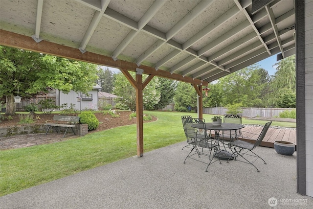 24213 41st Ave E, Spanaway, WA 98387 - view of patio / terrace with outdoor dining space, a deck, and an outdoor structure