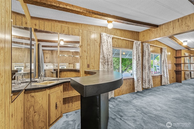 7300 32nd Ave NE Unit 5, Olympia, WA 98516 - bar with wood walls, a sink, carpet flooring, and beamed ceiling