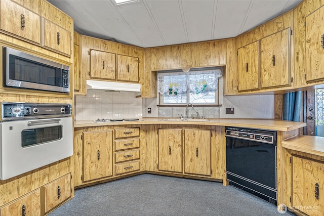 7300 32nd Ave NE Unit 5, Olympia, WA 98516 - kitchen featuring oven, dishwasher, stainless steel microwave, a sink, and under cabinet range hood
