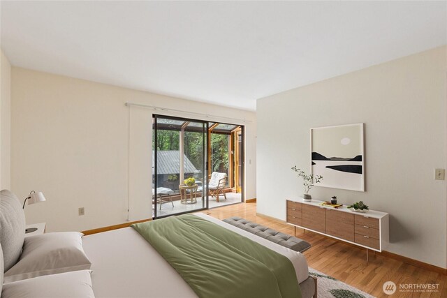 5019 E Mercer Way, Mercer Island, WA 98040 - bedroom featuring access to exterior, light wood-style floors, and baseboards