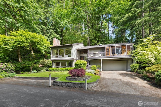 5019 E Mercer Way, Mercer Island, WA 98040 - view of front of home with driveway, a garage, a chimney, and a balcony