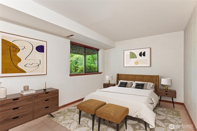 5019 E Mercer Way, Mercer Island, WA 98040 - bedroom with light tile patterned flooring and baseboards