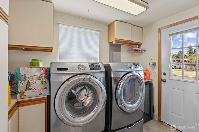 11876 SE 160th St, Renton, WA 98058 - washroom featuring washing machine and clothes dryer and light tile patterned floors