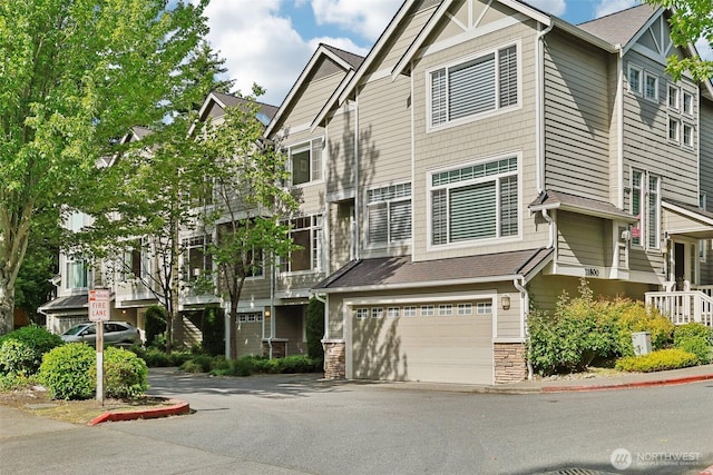 11800 SE 4th Pl Unit 203, Bellevue, WA 98005 - view of property with an attached garage