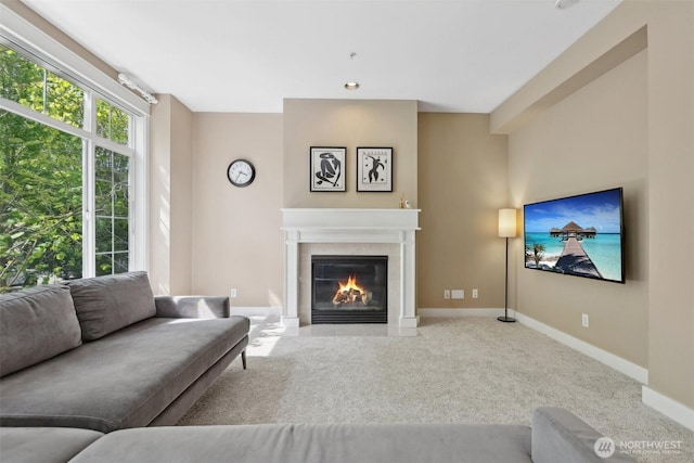 11800 SE 4th Pl Unit 203, Bellevue, WA 98005 - carpeted living area with a fireplace with flush hearth and baseboards