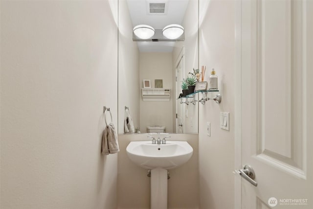 11800 SE 4th Pl Unit 203, Bellevue, WA 98005 - half bathroom featuring a sink