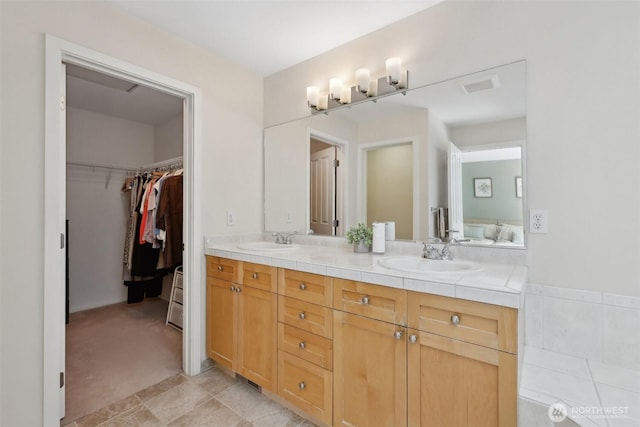 11800 SE 4th Pl Unit 203, Bellevue, WA 98005 - full bathroom featuring double vanity and a walk in closet