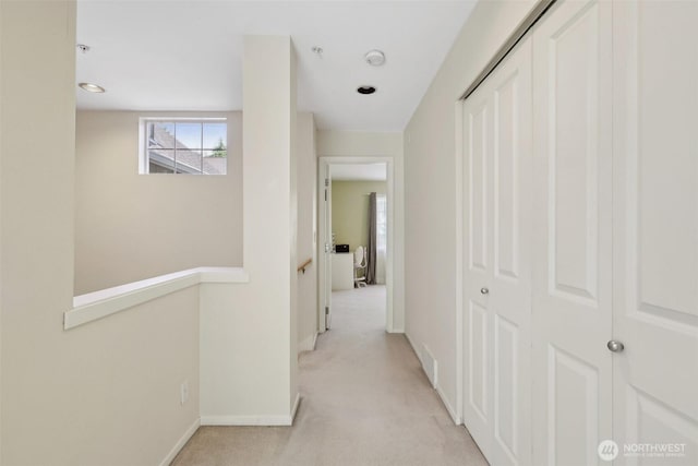 11800 SE 4th Pl Unit 203, Bellevue, WA 98005 - corridor with light colored carpet and baseboards