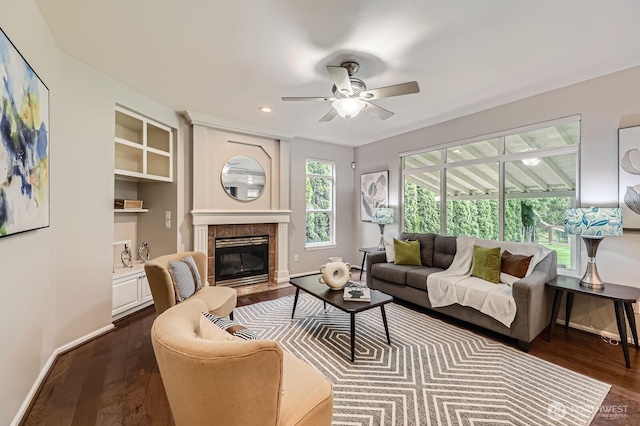 3402 174th Pl SE, Bothell, WA 98012 - living area featuring dark wood-style floors, ceiling fan, a tiled fireplace, baseboards, and recessed lighting