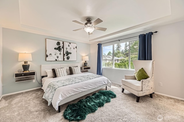 3402 174th Pl SE, Bothell, WA 98012 - carpeted bedroom with a tray ceiling, baseboards, and ceiling fan