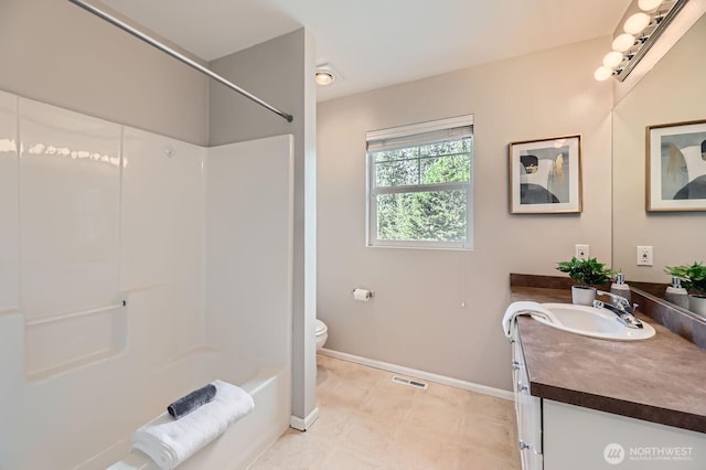 3402 174th Pl SE, Bothell, WA 98012 - bathroom with vanity, toilet, baseboards, and shower / bathtub combination