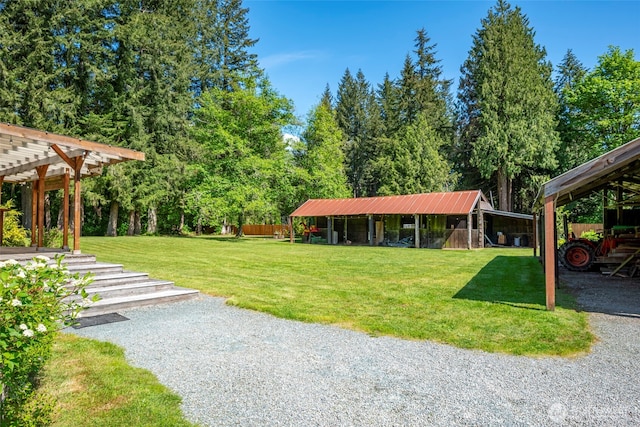 20800 Hartry Ln, Sedro Woolley, WA 98284 - view of grassy yard featuring a pergola and an outbuilding