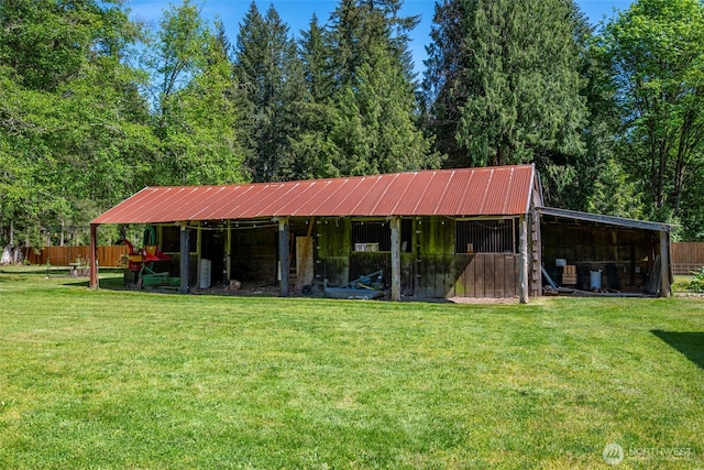 20800 Hartry Ln, Sedro Woolley, WA 98284 - back of property featuring an outdoor structure, metal roof, and an exterior structure