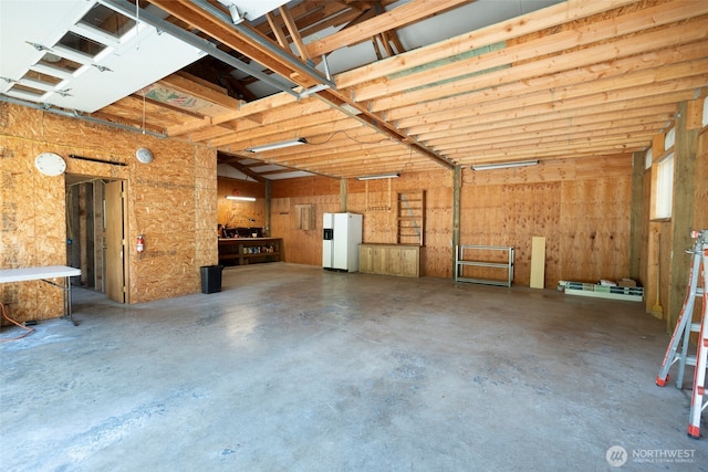 20800 Hartry Ln, Sedro Woolley, WA 98284 - garage featuring white refrigerator with ice dispenser