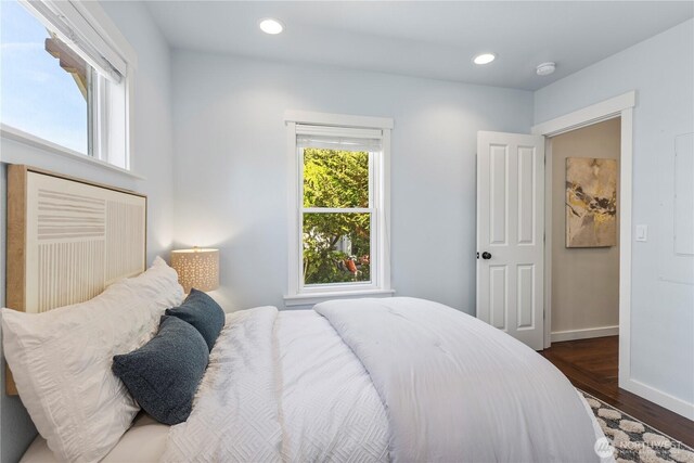 1220 SW Orchard St, Seattle, WA 98106 - bedroom featuring dark wood-style floors, baseboards, and recessed lighting