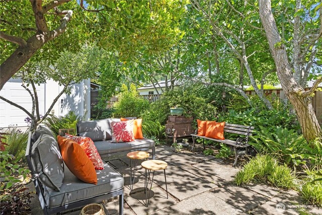 1220 SW Orchard St, Seattle, WA 98106 - fenced backyard with a patio area and outdoor lounge area