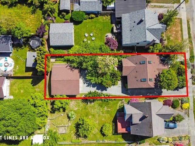 1220 SW Orchard St, Seattle, WA 98106 - aerial perspective of suburban area featuring property parcel outlined