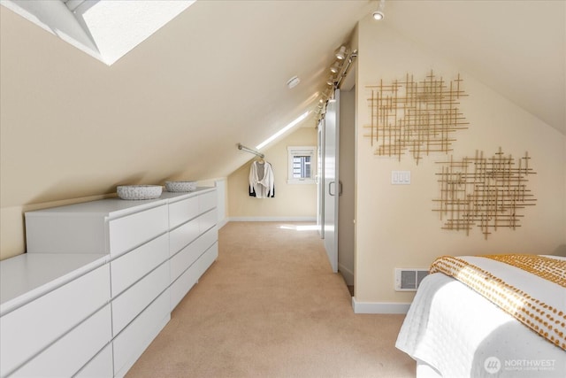 1220 SW Orchard St, Seattle, WA 98106 - bedroom with vaulted ceiling, light colored carpet, baseboards, and track lighting