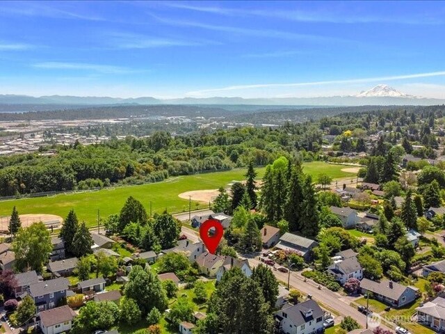1220 SW Orchard St, Seattle, WA 98106 - aerial view of residential area with a mountain backdrop