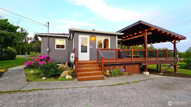 4319 H Street Rd, Blaine, WA 98230 - view of front of home featuring stucco siding and a wooden deck