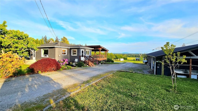 4319 H Street Rd, Blaine, WA 98230 - view of front of home featuring a front yard, driveway, and stucco siding