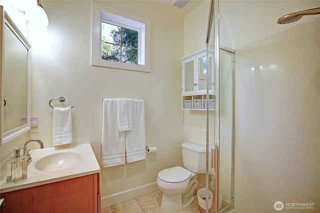 1577 Arrowhead Beach Rd, Camano Island, WA 98282 - full bathroom featuring vanity, a shower stall, toilet, tile patterned floors, and baseboards