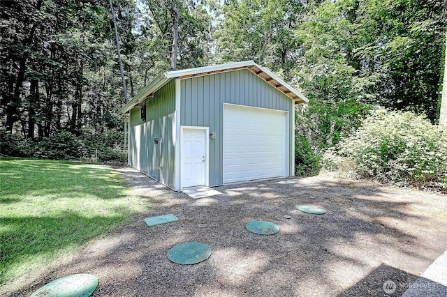 1577 Arrowhead Beach Rd, Camano Island, WA 98282 - detached garage featuring a wooded view
