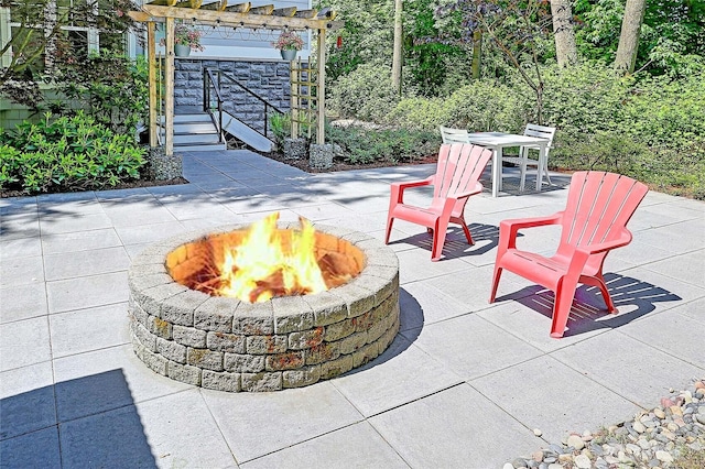1577 Arrowhead Beach Rd, Camano Island, WA 98282 - view of patio with an outdoor fire pit, a pergola, and outdoor dining area