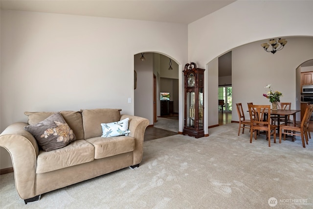 3210 275th St NE, Arlington, WA 98223 - carpeted living area featuring arched walkways