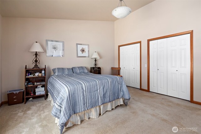 3210 275th St NE, Arlington, WA 98223 - bedroom featuring carpet, multiple closets, and baseboards