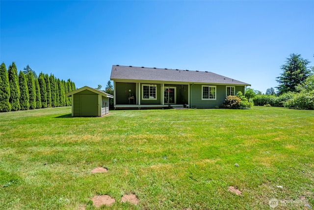 3210 275th St NE, Arlington, WA 98223 - back of house with a yard and a sunroom