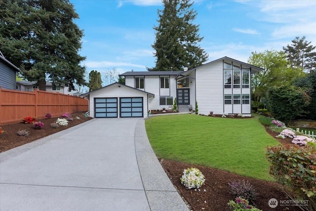 12816 130th Ct NE, Kirkland, WA 98034 - mid-century modern home with an outbuilding, a detached garage, and driveway
