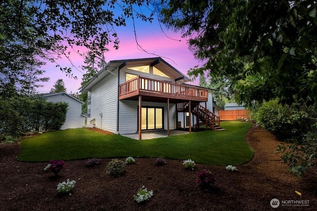 12816 130th Ct NE, Kirkland, WA 98034 - back of house at dusk with a deck, a patio area, and stairs